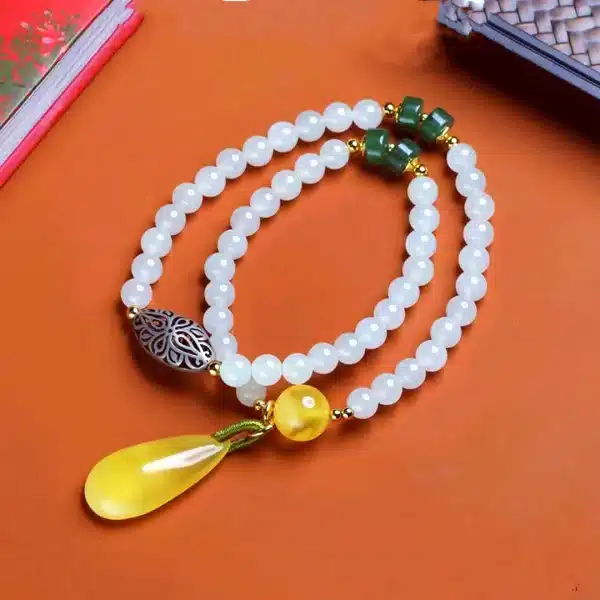 按amage of Double Circle Hetian Jade Bracelet