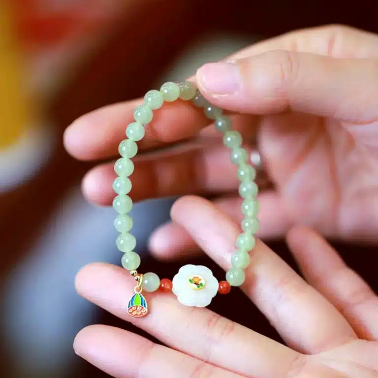 an amage of White Jade Flower Hetian Jade Bracelet