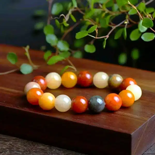 an amage of Natural Gold Silk Jade Bracelet