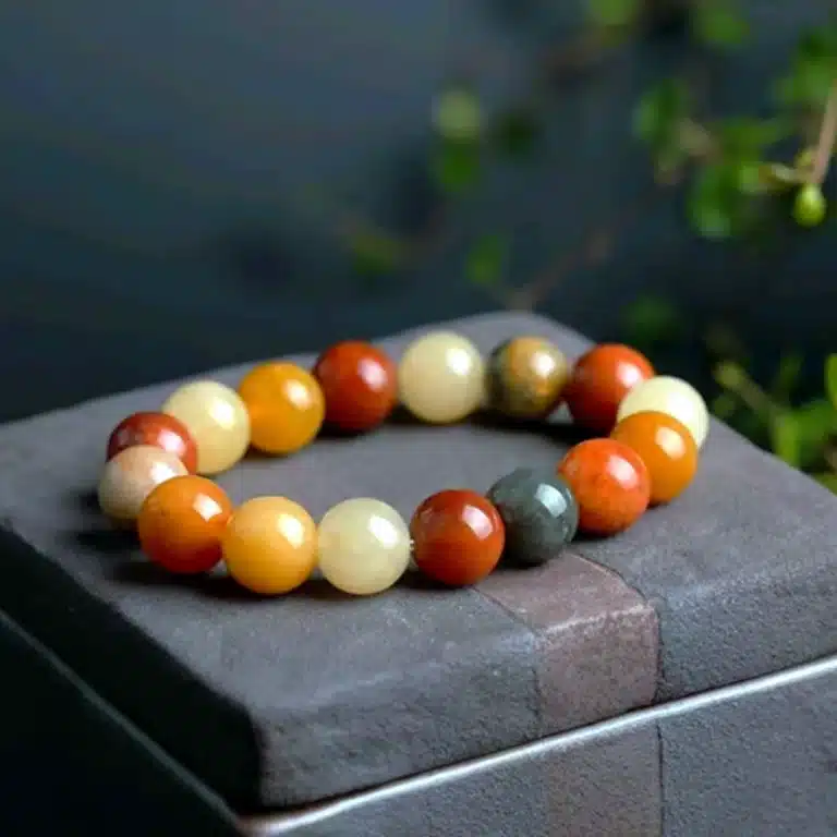 an amage of Natural Gold Silk Jade Bracelet